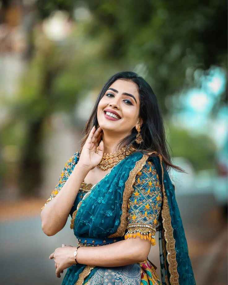 Portrait photography of a woman smiling outdoors