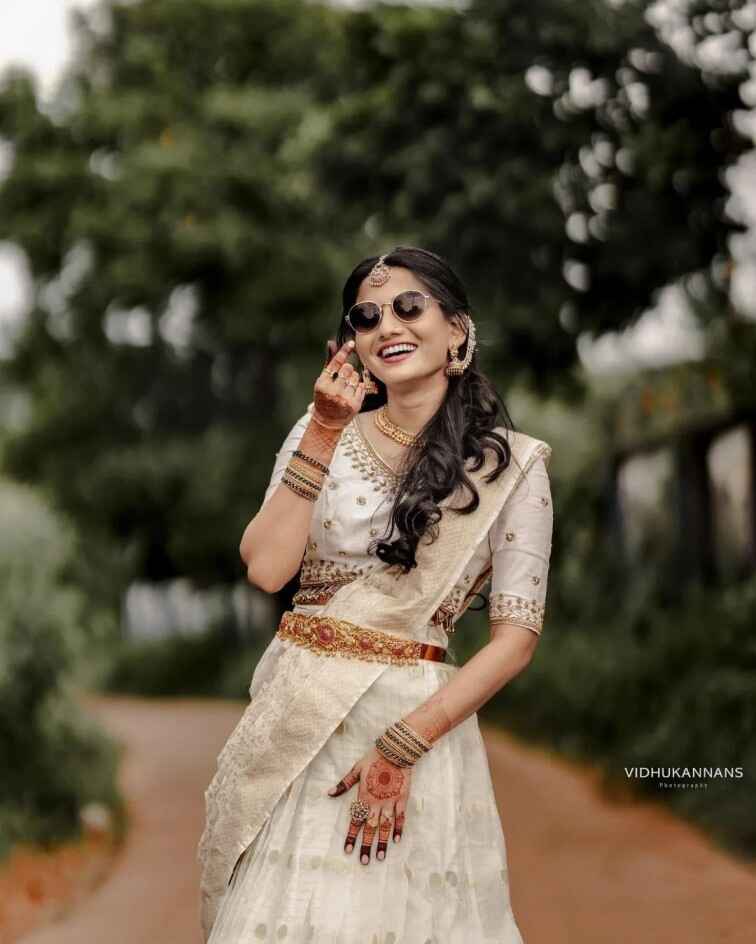portrait photography of a women in traditional indian outfit