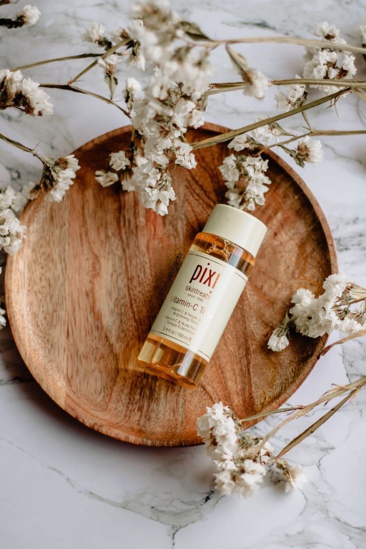 Wedding flat lay photography with rings and decorative elements